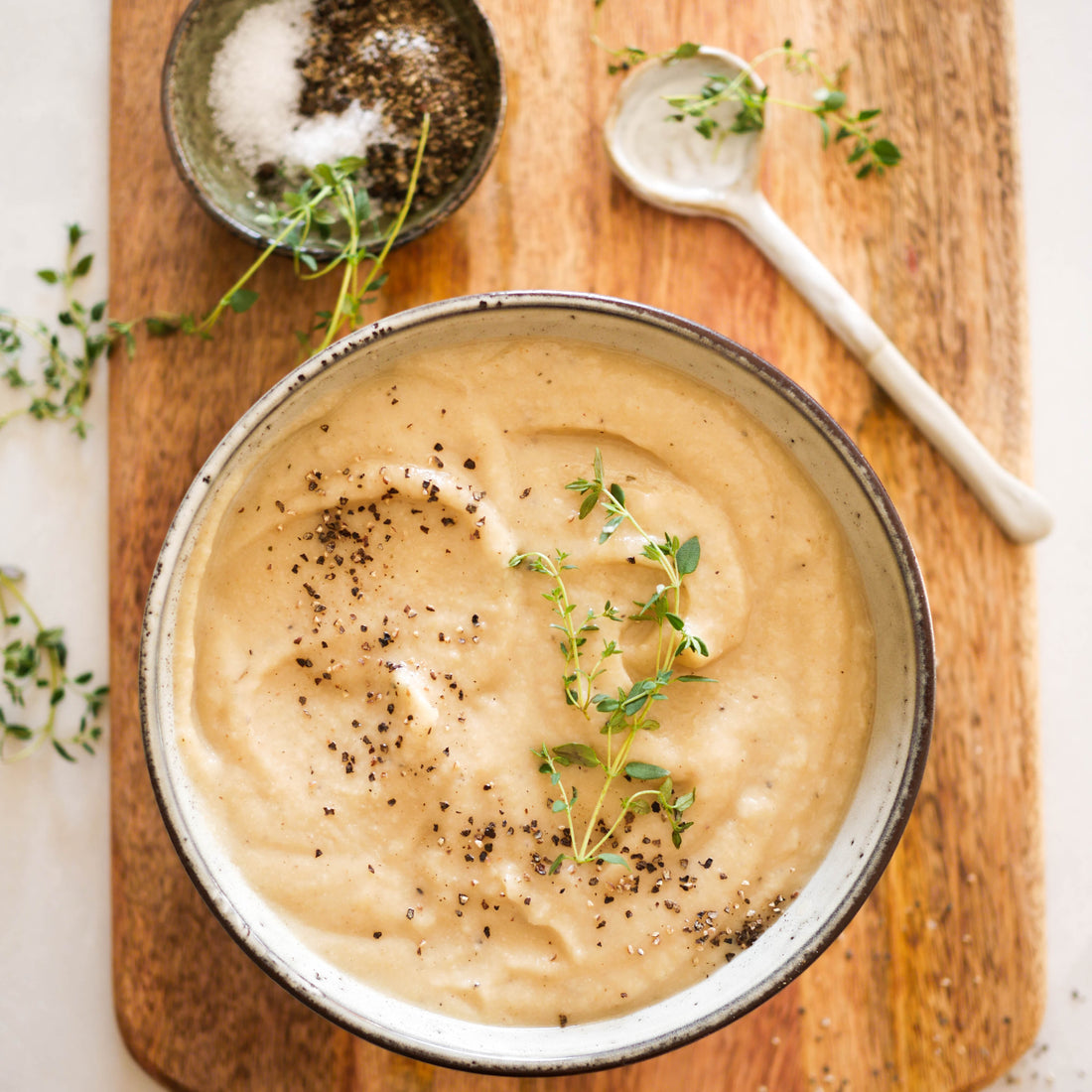 Cheesy Roast Garlic and Cauliflower Soup